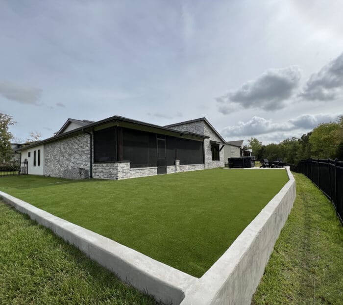 Concrete Retaining Wall with Artificial Turf in College Station, Texas