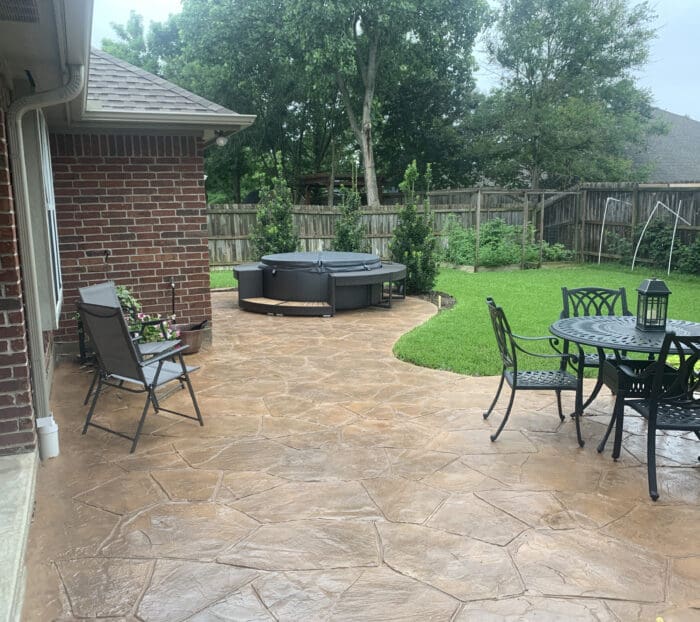 Concrete Patio with a Flagstone Stamp and Stain in College Station, Texas