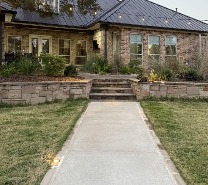 Concrete Walkway with a Brick Border in Bryan, Texas