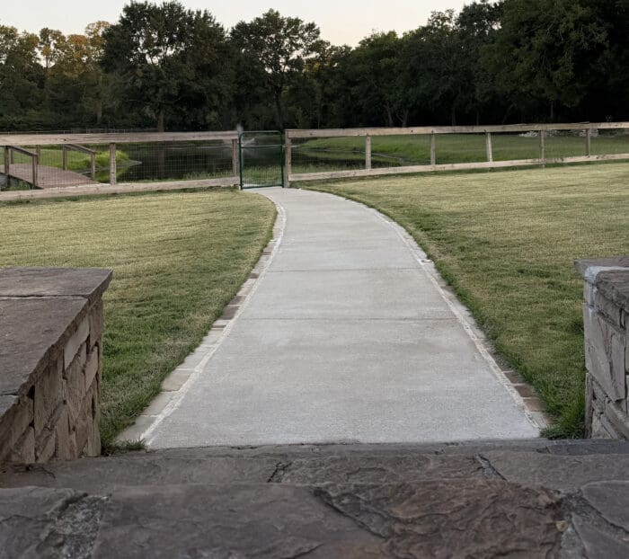 Concrete Walkway with a Paver Border in Bryan, Texas