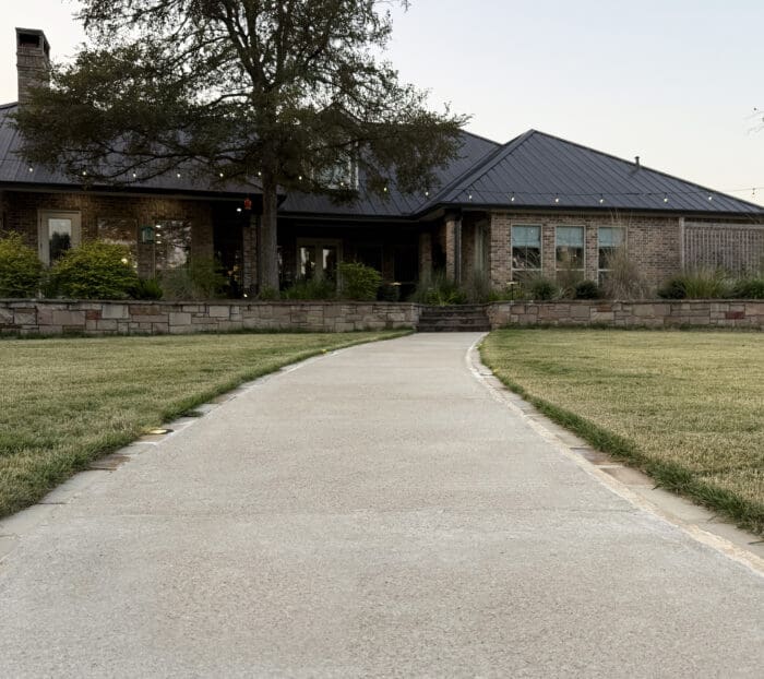 Concrete Walkway with a Paver Border in Bryan, Texas