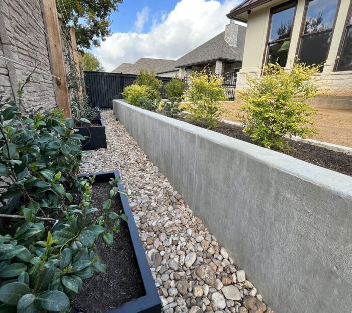 Concrete Retaining Wall and Planter Bed in College Station, Texas